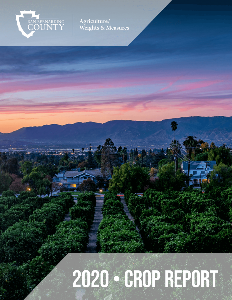 A photo of the cover of the 2020 AWM Crop Report with a picture of Redlands Historic homes in the background and citrus trees in the foreground.